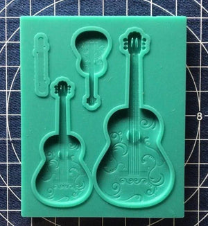Guitar silicone mould, 6.7x3cm, 4.7x2.1cm, 2.9x1.3cm