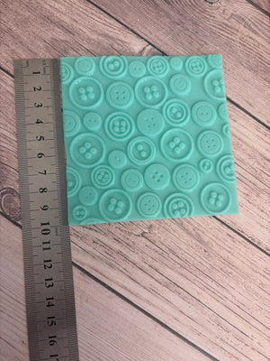 Pre loved mould buttons onlay