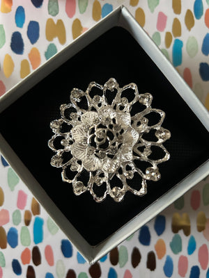 Diamante brooch cake decorating