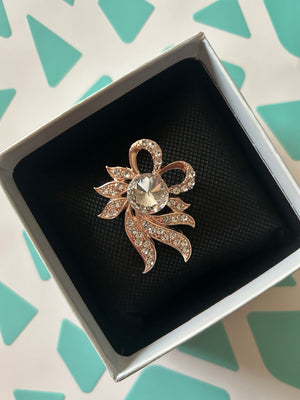 Diamante brooch cake decorating  rose gold