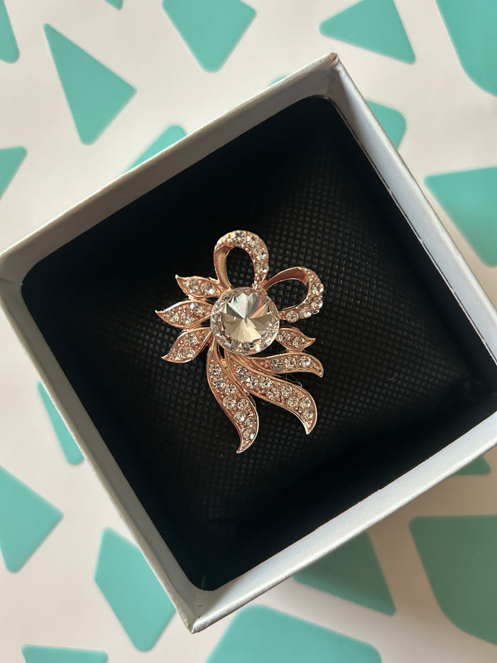 Diamante brooch cake decorating  rose gold